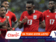 Panama national soccer team players in red jerseys celebrating on the field