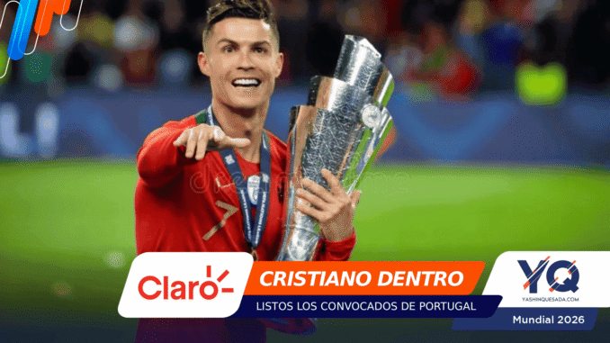 Cristiano Ronaldo celebrating with a tall silver trophy and medal on a football pitch.