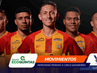 Five soccer players in red-and-yellow uniforms pose together against a dark background, with colorful banners and a bold orange MOVIMIENTOS banner across the bottom.