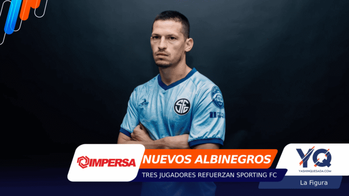 Portrait of a man in a light-blue jersey with arms crossed, standing against a dark gradient backdrop with colorful graphic overlays at the left and bottom edges, including sponsor logos.