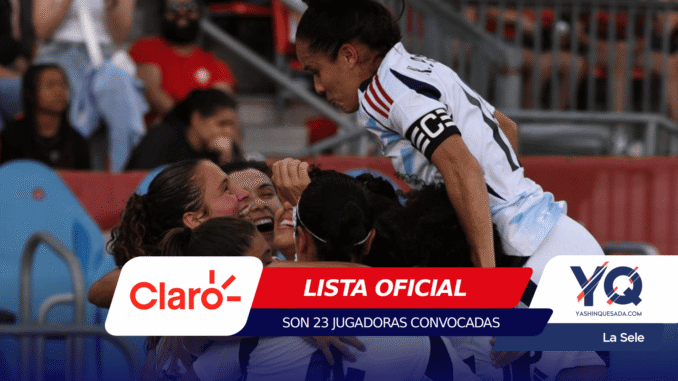 Group of female soccer players celebrating together, lifting a teammate in a white jersey on the field