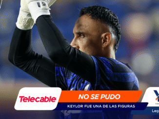 Soccer goalkeeper raising gloved hands in celebration, with bold brand banners overlaying the scene