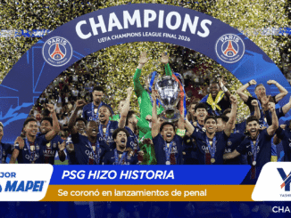 Paris Saint-Germain players celebrate the UEFA Champions League title on stage with trophy and confetti under a large 'CHAMPIONS' banner.