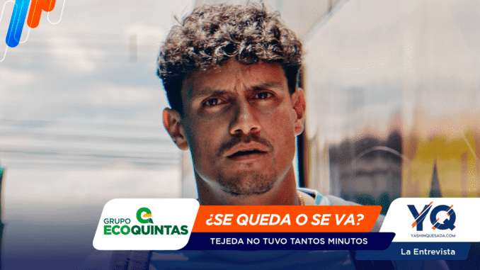 Close-up portrait of a man with curly dark hair on a promotional banner with blue and orange shapes and sponsor logos in the corners.