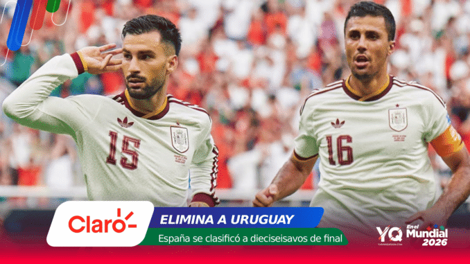 Two Uruguay national team players celebrate on the field; foreground banner shows Claro logo and the text 'ELIMINA A URUGUAY' with other sponsor graphics.
