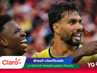 Two Brazilian football players celebrate a goal on the field, smiling with their arms around each other; foreground features Claro logo and colorful headline graphics
