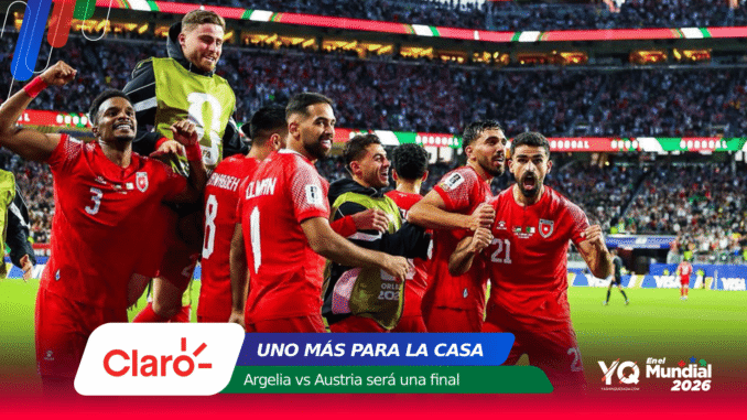 Red-clad soccer players celebrate together on the field as a full stadium cheers behind them, bannered with sponsor logos.