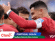 Group of soccer players in red jerseys celebrating on the field; one arm raised, sponsor logos visible; overlay text says 'Portugal Golea' and 'Cristiano Ronaldo hizo historia'