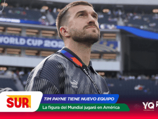 Close-up of a male athlete looking upward in a stadium during a FIFA World Cup 2026 promo, with colorful overlay graphics and sponsor logos in the foreground