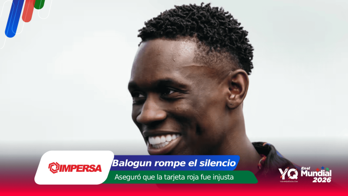 Close-up of a smiling Black man with a light background and colorful banner graphics at the bottom edge.