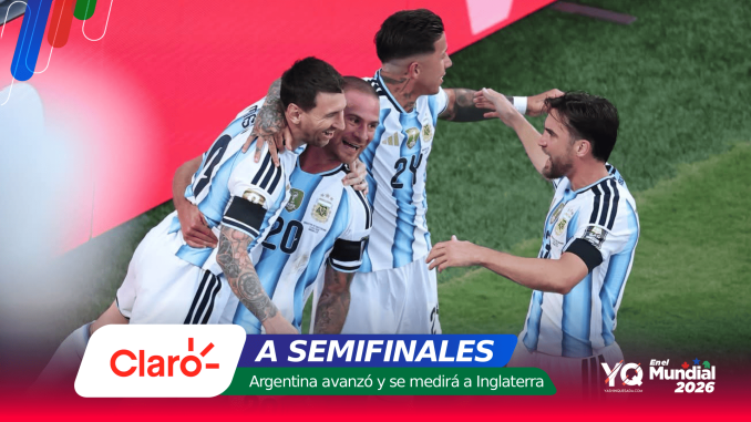 Argentina national team players celebrate together on the soccer field.