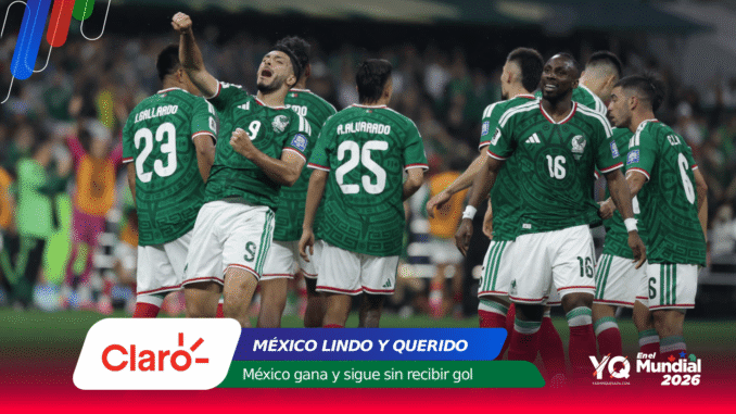 Mexican national team players in green jerseys celebrate on the field, numbers 23 and 25 visible, stadium crowd in background.