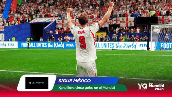 England forward Kane (No. 9) celebrates with fists raised on a green pitch as a packed stadium cheers behind him at the World Cup 2026.