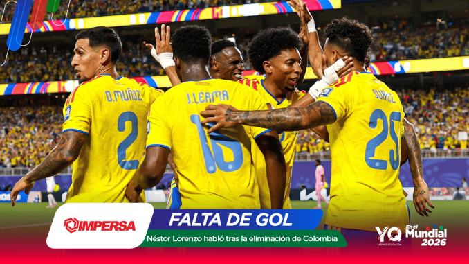 Colombian soccer players in yellow jerseys celebrate a goal on the field with teammates amid a cheering crowd.