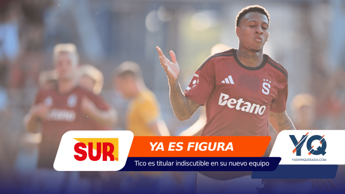 Soccer player in a maroon jersey celebrates with a raised hand, overlaid by sponsor banners saying 'YA ES FIGURA'.