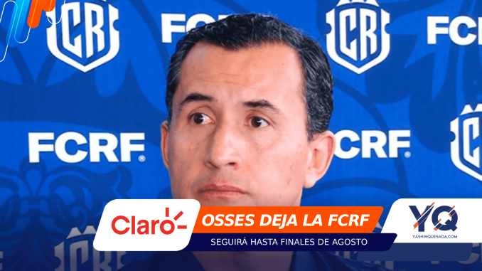Close-up of a man at a press event against a blue backdrop with FCRF logos and campaign banners visible.