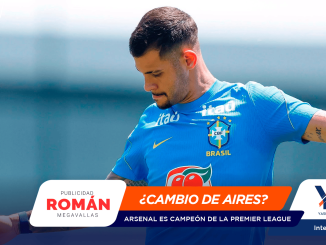 Brazilian footballer in a blue Brazil shirt with the CBF crest, looking down and extending his arm against a blue blurred background; colorful page banner overlays.